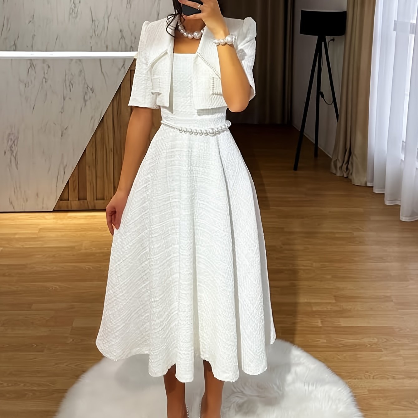 Stylish, elegant and minimalist two-piece set of solid color suit jacket and dress without pearl belt