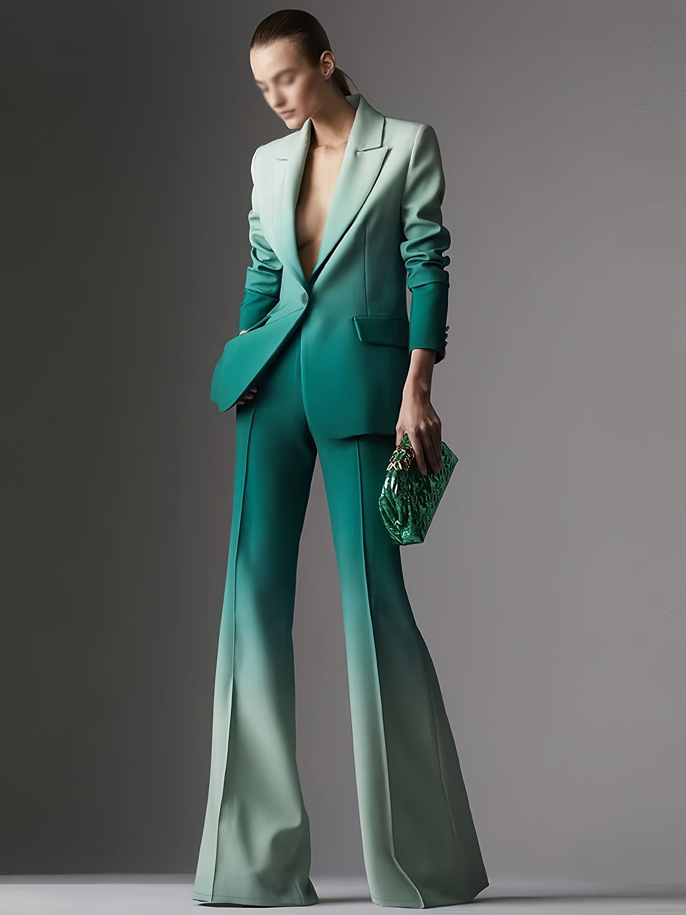 A Stylish And Elegant Women'S Two-Piece Set Featuring a Gradient Color Printed Single-Button Blazer And Flared Pants.