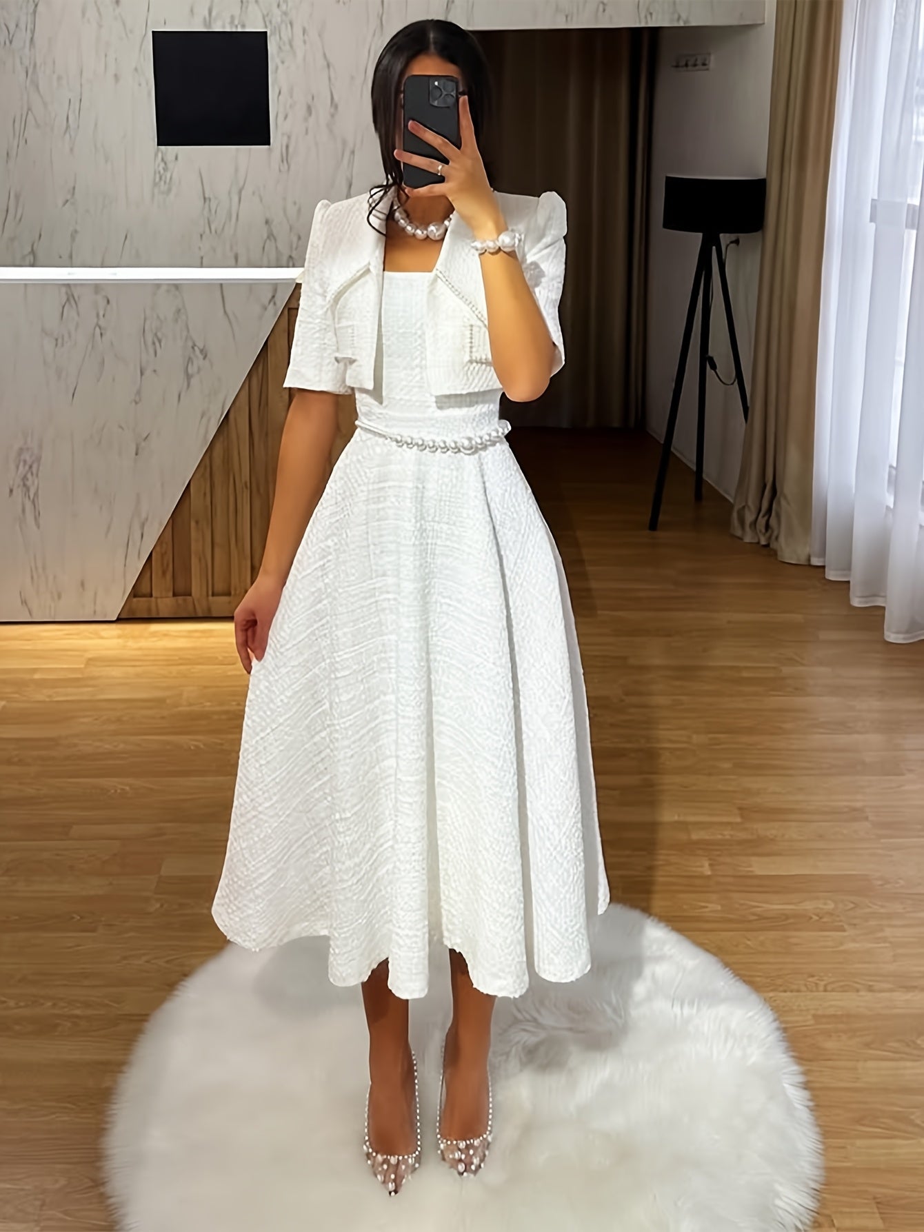 Stylish, elegant and minimalist two-piece set of solid color suit jacket and dress without pearl belt