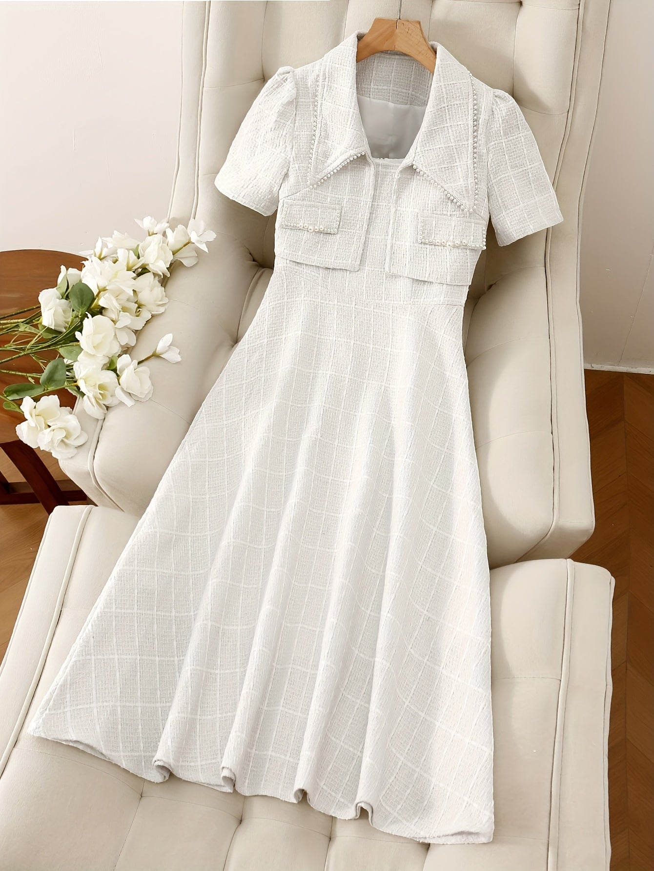 Stylish, elegant and minimalist two-piece set of solid color suit jacket and dress without pearl belt